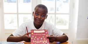 Butterfly_centre_butterfly_boy_showing_off_his_new_math_workbook_1528900935_1582209499