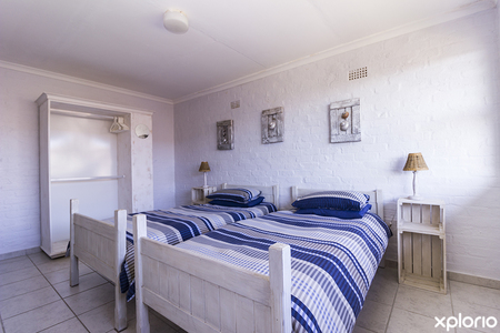 gansbaai_accommodation_boetiek_huis_unit_2_second_bedroom_side_view_1606809257