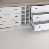 Concrete with Stucco Finish. Drawers and Wine Rack in Satin White Spray Finish - PCF Kitchens - Xplorio™ Pringle Bay
