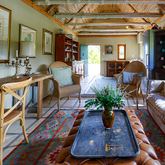 The Farnhouse Open-Plan Lounge - Bodhi Khaya Nature Retreat - Xplorio™ Gansbaai