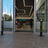 Nacre Polished Abalone Concrete Pavers 900x450x40mm Charcoal with Black Stone - Client (Checkers Constantia Emporium) - Cape Stone - Xplorio™ Hermanus