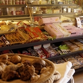 Typically Deli, when the shelves look busy while they stand still... - Dal-Italia Delicatessen - Xplorio™ Hermanus