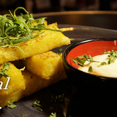 A light Italian nibble, Polenta sticks with Aioli sauce. A perfect companion to your morning coffee or a lunchtime glass. Dal-Italia, creating a unique dining and shopping experience in Hermanus - Dal-Italia Delicatessen - Xplorio™ Hermanus