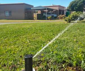 Green Grass with an Irrigation System