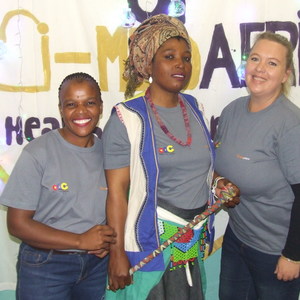 Zokhanya Bikani, student Nangamso Nojaja (in a traditional dress) and Gretha Hanekom.