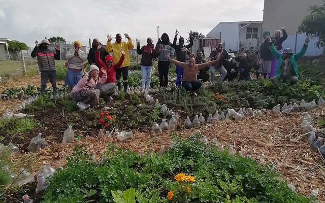 Community/Training Garden - students in the garden.
